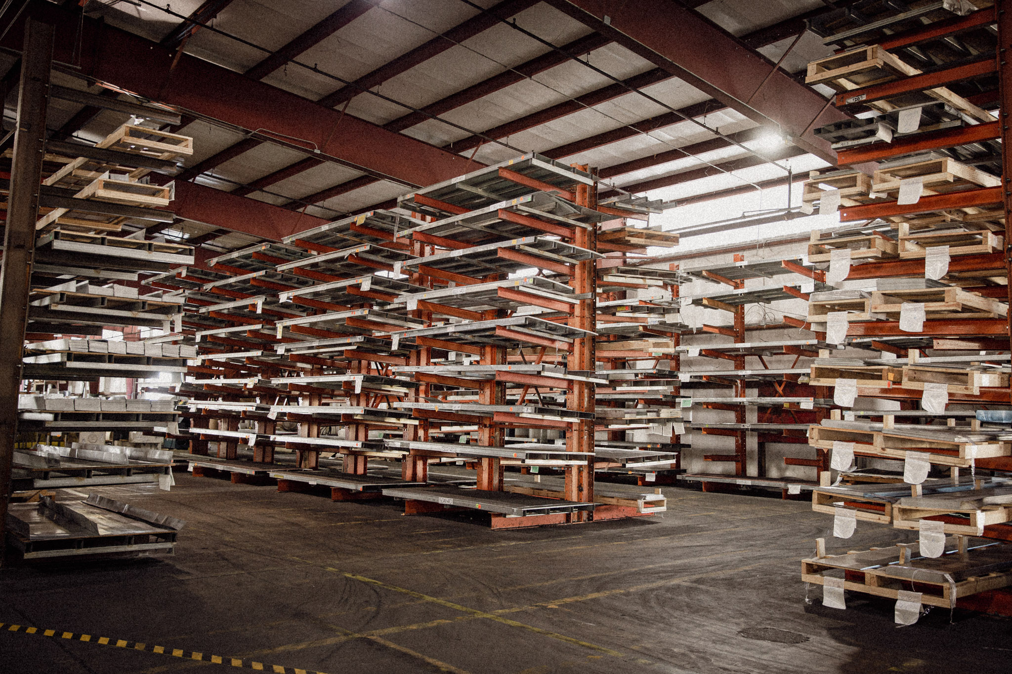 Metal storage racks in industrial warehouse