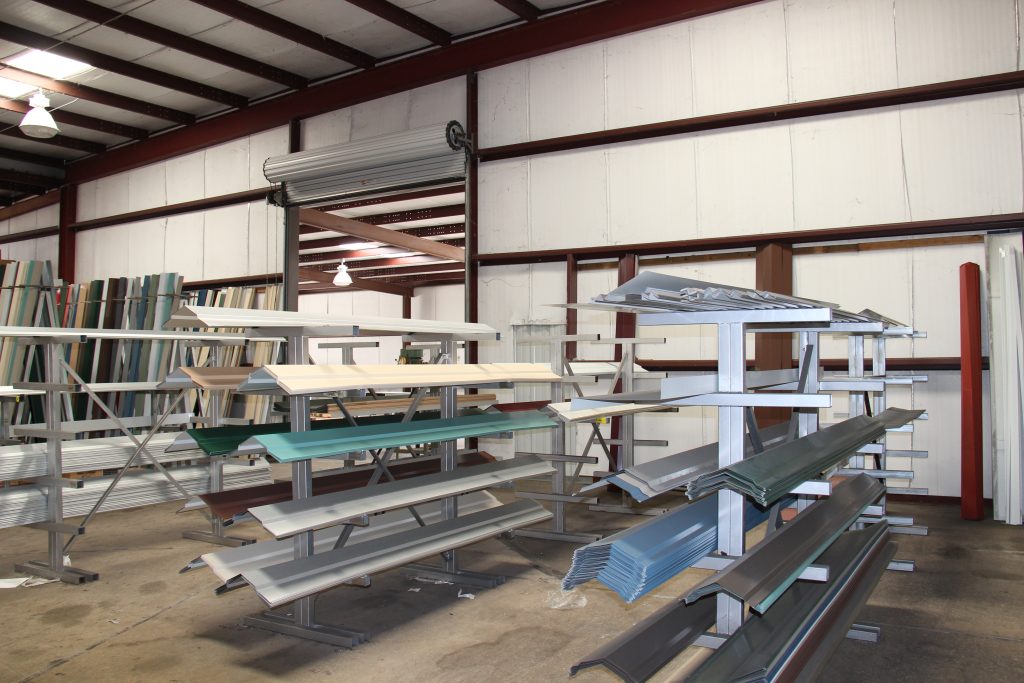 Metal sheets stored in warehouse racks