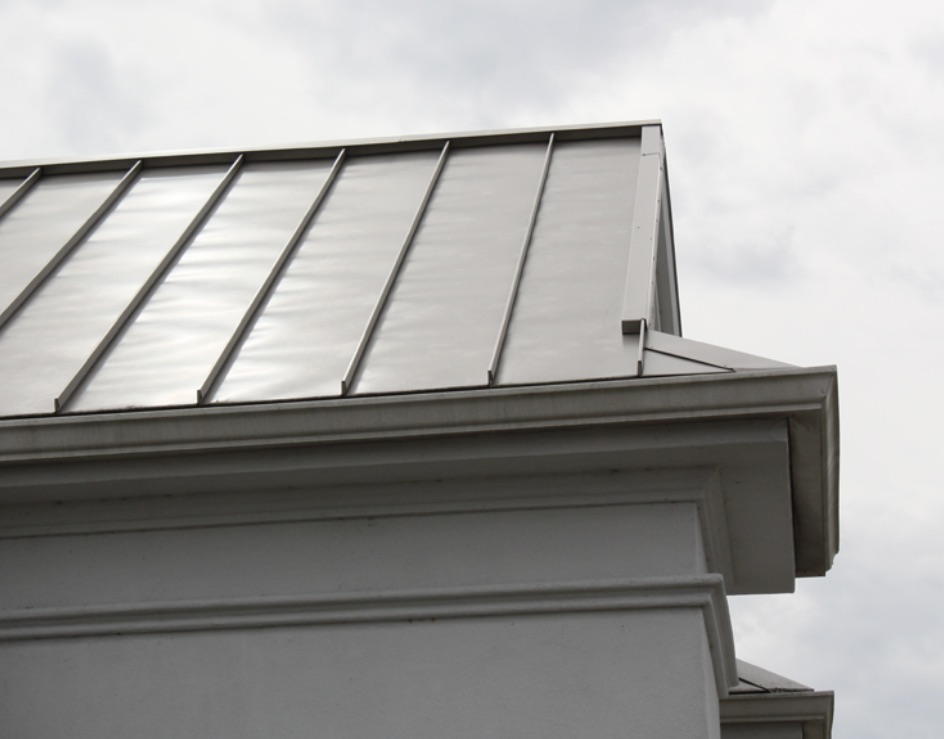 Modern metal roof with overcast sky